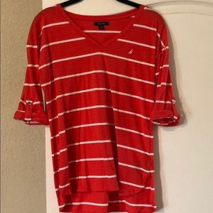 Striped coral colored Nautica shirt.